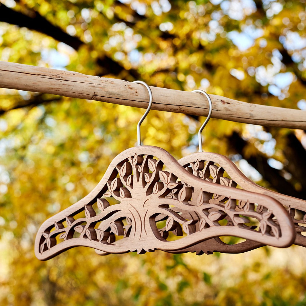 https://radianthomeproducts.com/cdn/shop/files/Radiant-Home-Products-Tree-Of-Life-Hanger-Silver-Fall-Lifestyle_a0b9d641-842c-4a7e-9809-bc7c9694e61c.jpg?v=1698342577&width=1445